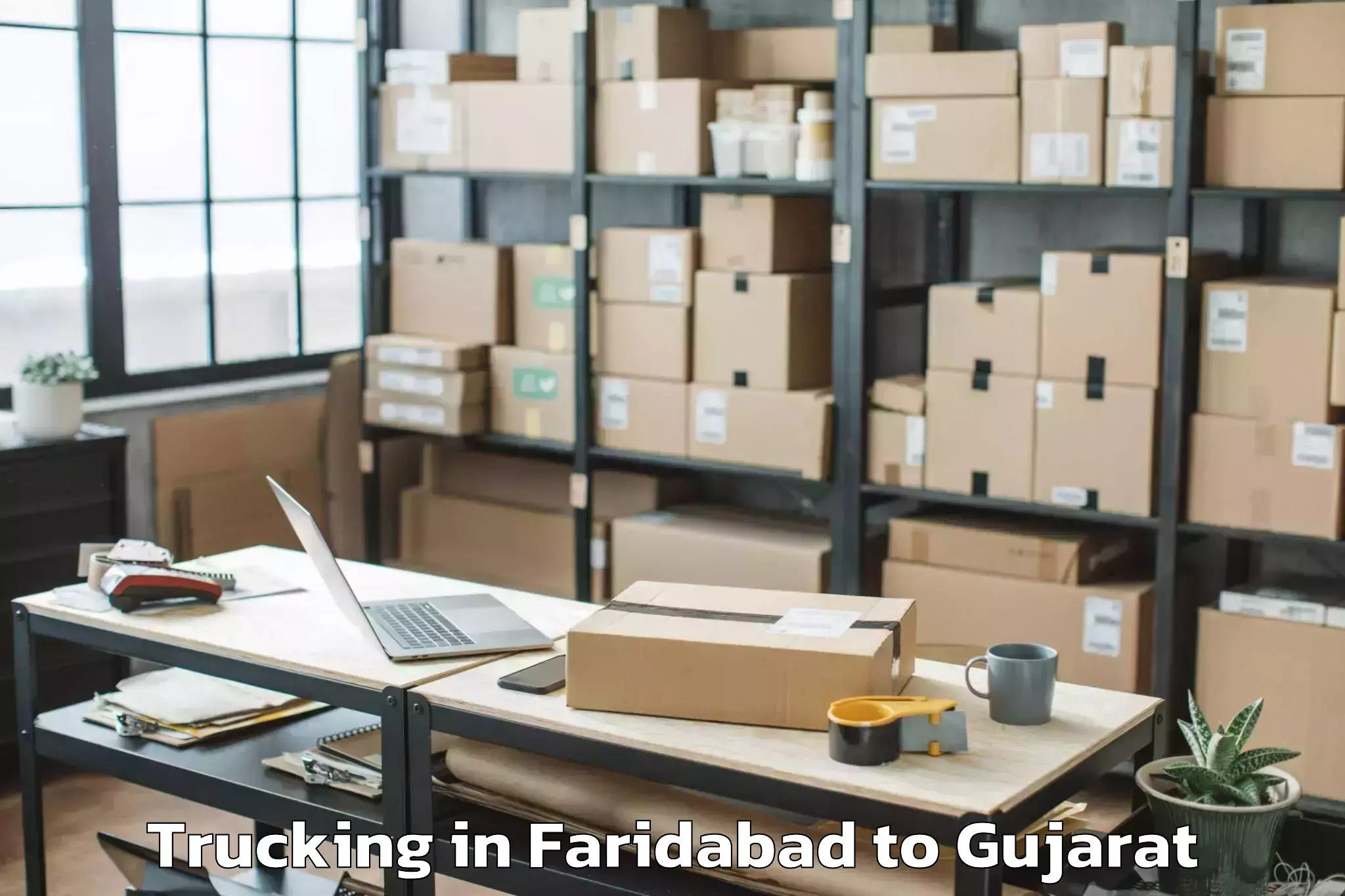 Easy Faridabad to Netrang Trucking Booking